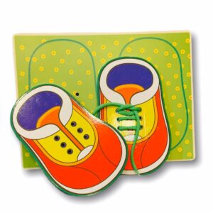 Tablero de aprendizaje “Atar Cordones”